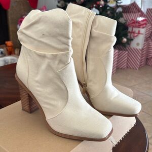 Jessica Simpson booties. Cream color, a canvas material.